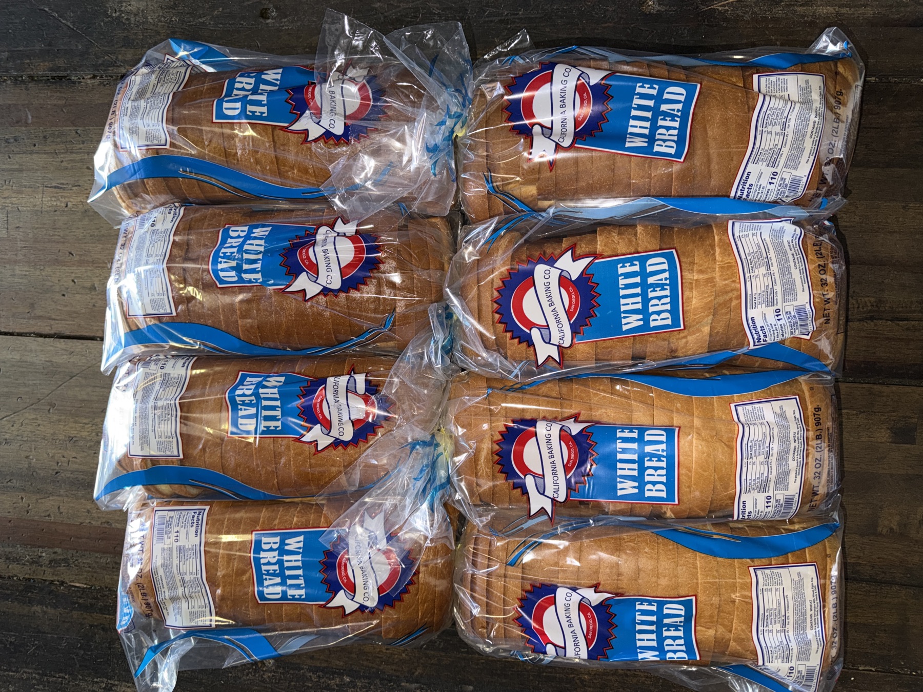 Plain hamburger buns stacked for delivery