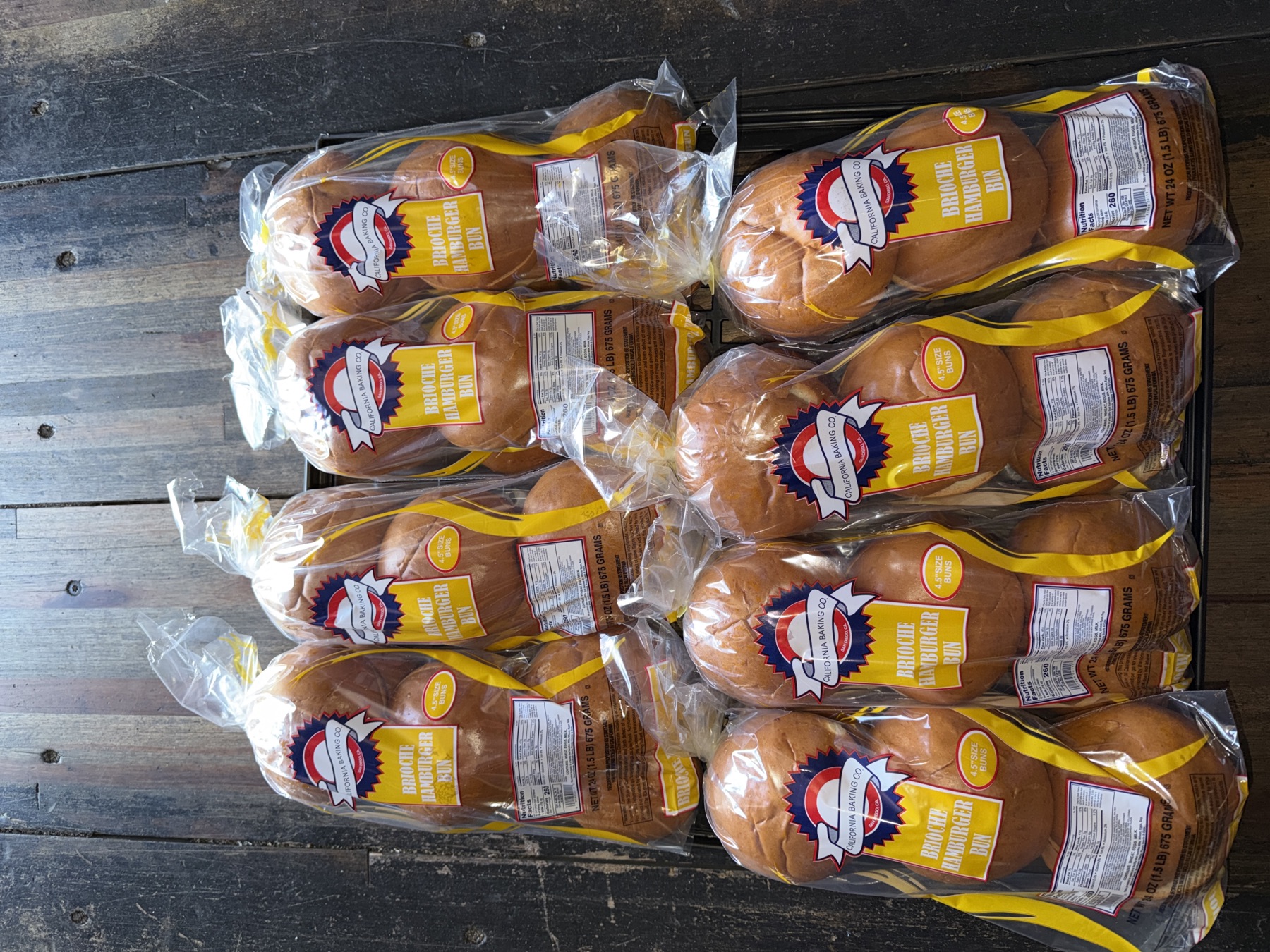 Sesame hamburger buns packed in rows